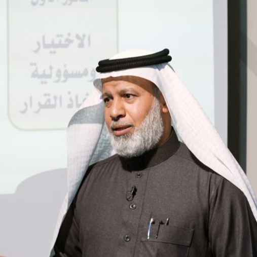 الأستاذ علي العباد